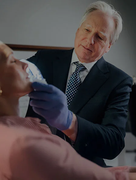 Dr. Carney with facial plastic surgery patient